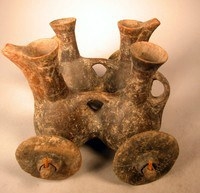 Persian Amlash four jugs conjoined on wheels, 1,000 BC - courtesy Milwaukee Public Museum